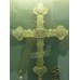 Cross buttony with a rounded swastika in the center
